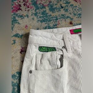 White corduroy pants